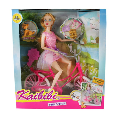 Muñeca con bicicleta y accesorios