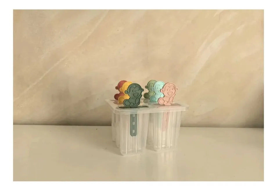 Molde para paletas con tapa y palitos en forma de monitos